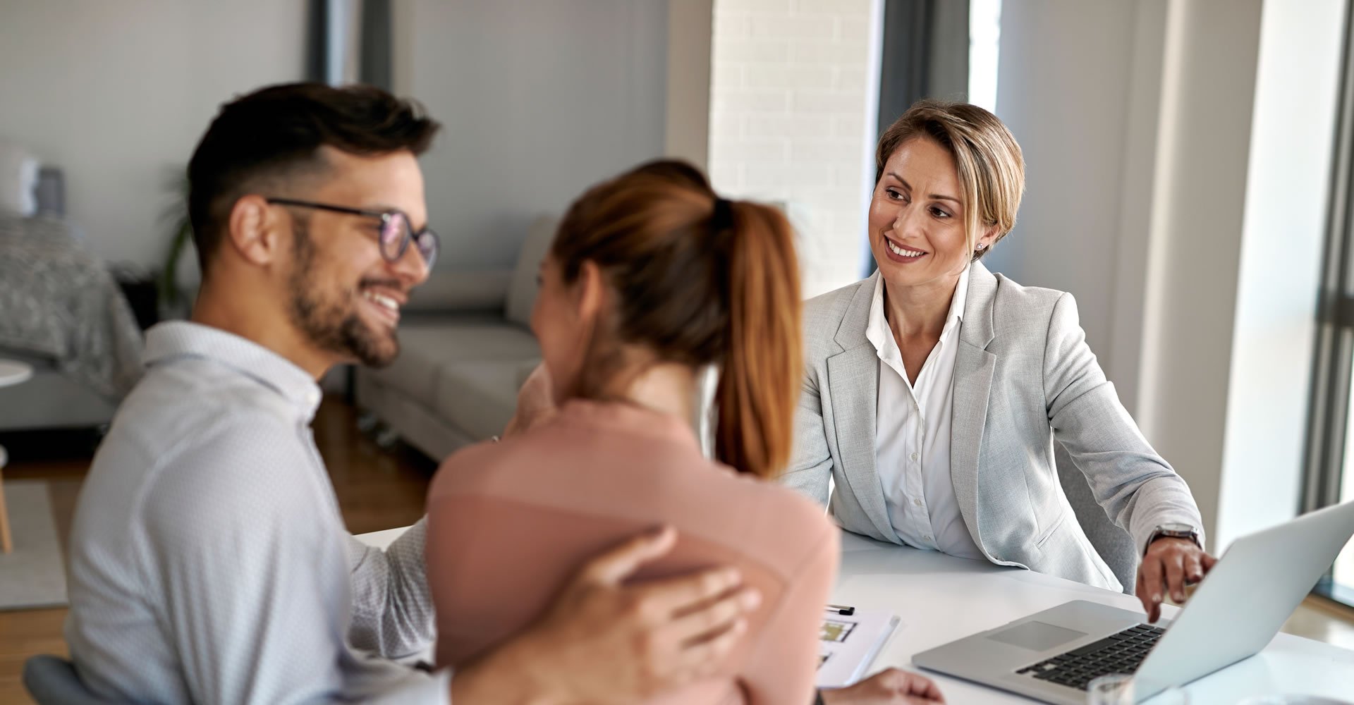 Employees celebrating and collaborating in an office setting